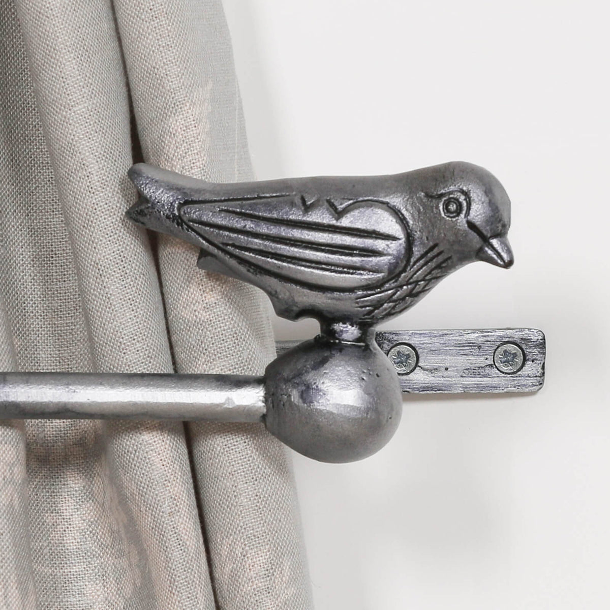Ornate silver bird curtain holdbacks uk